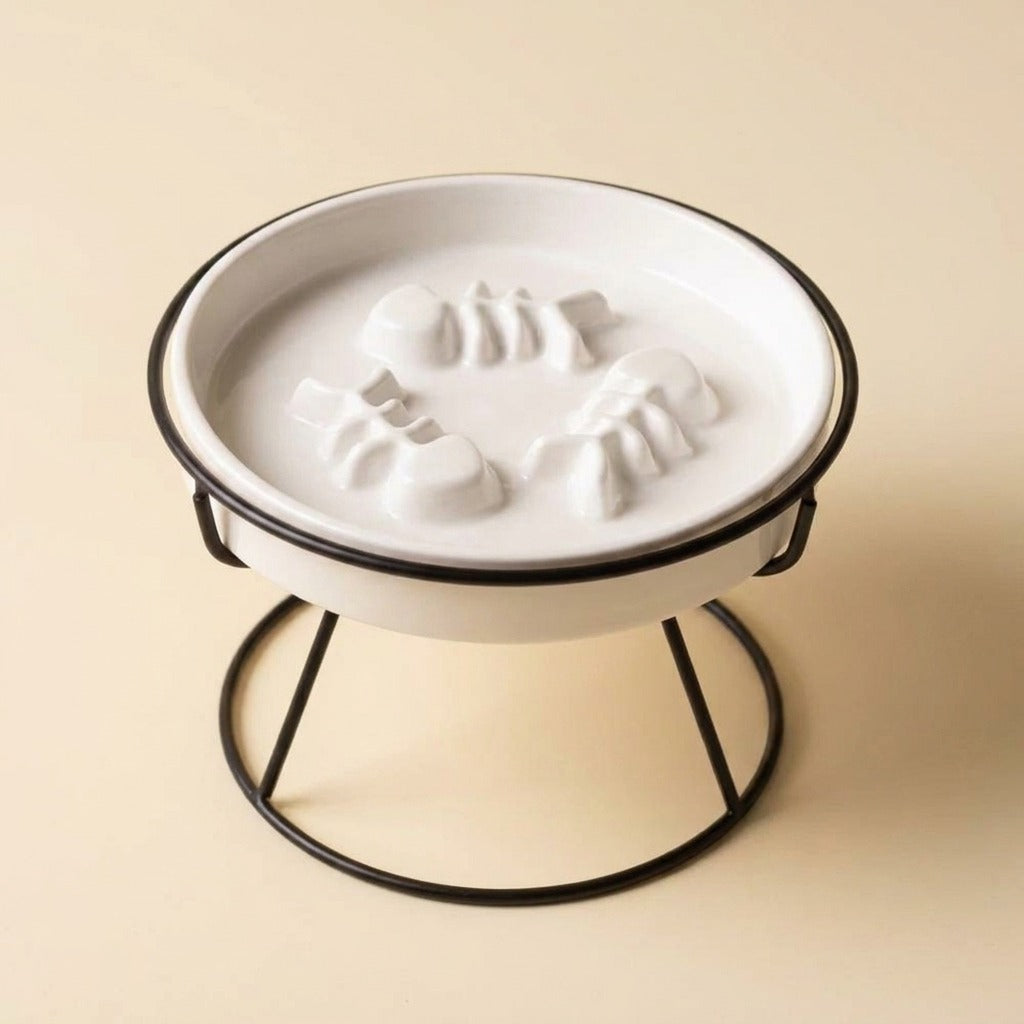 Flat Face Slow Feed Dish, white plate on black stand, studio shot