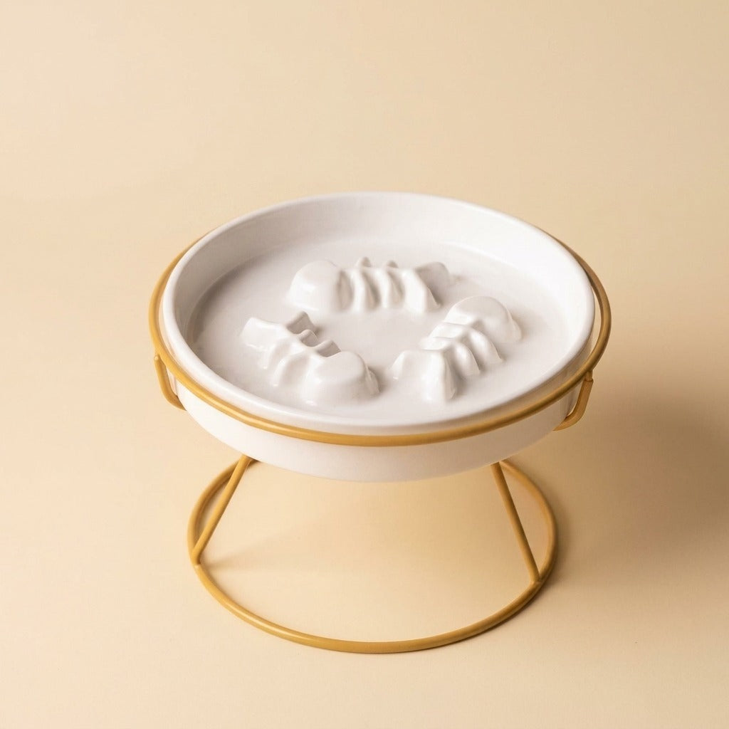 Flat Face Slow Feed Dish, white plate on gold stand, studio shot