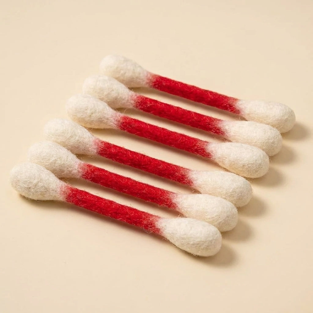 Giant felt cotton bud cat kick sticks in a six pack