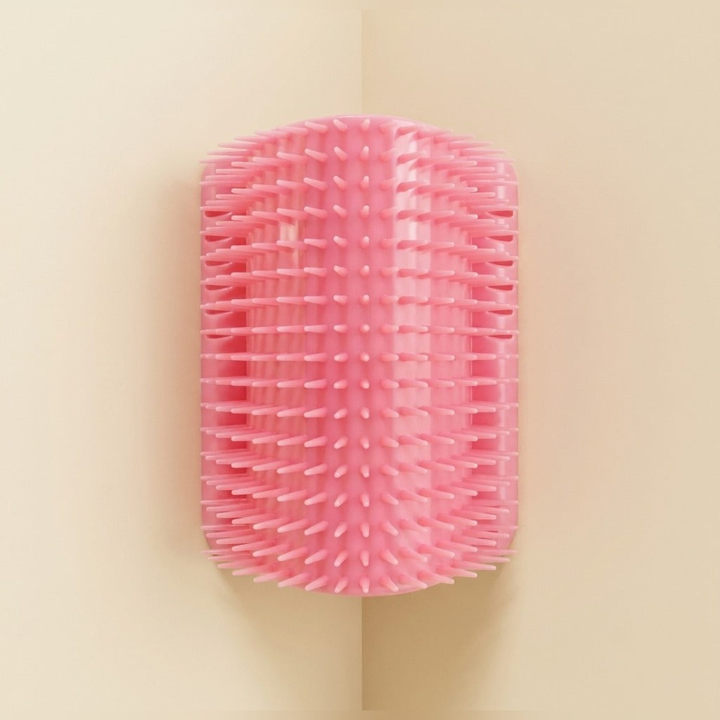Corner Self Groomer Brush in pink, studio shot