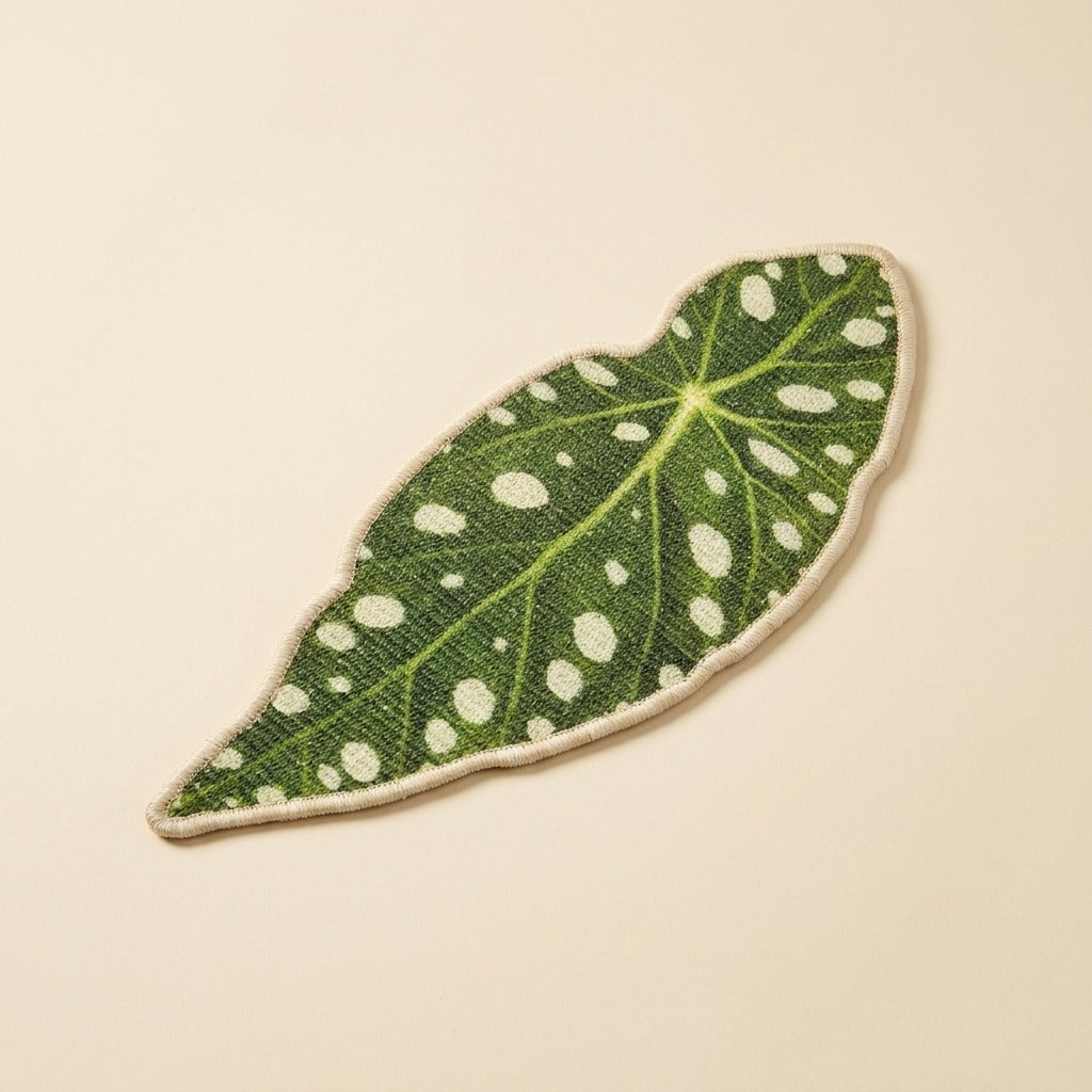 Leaf Sisal Cat Scratch Mat, spotted leaf shape, studio shot