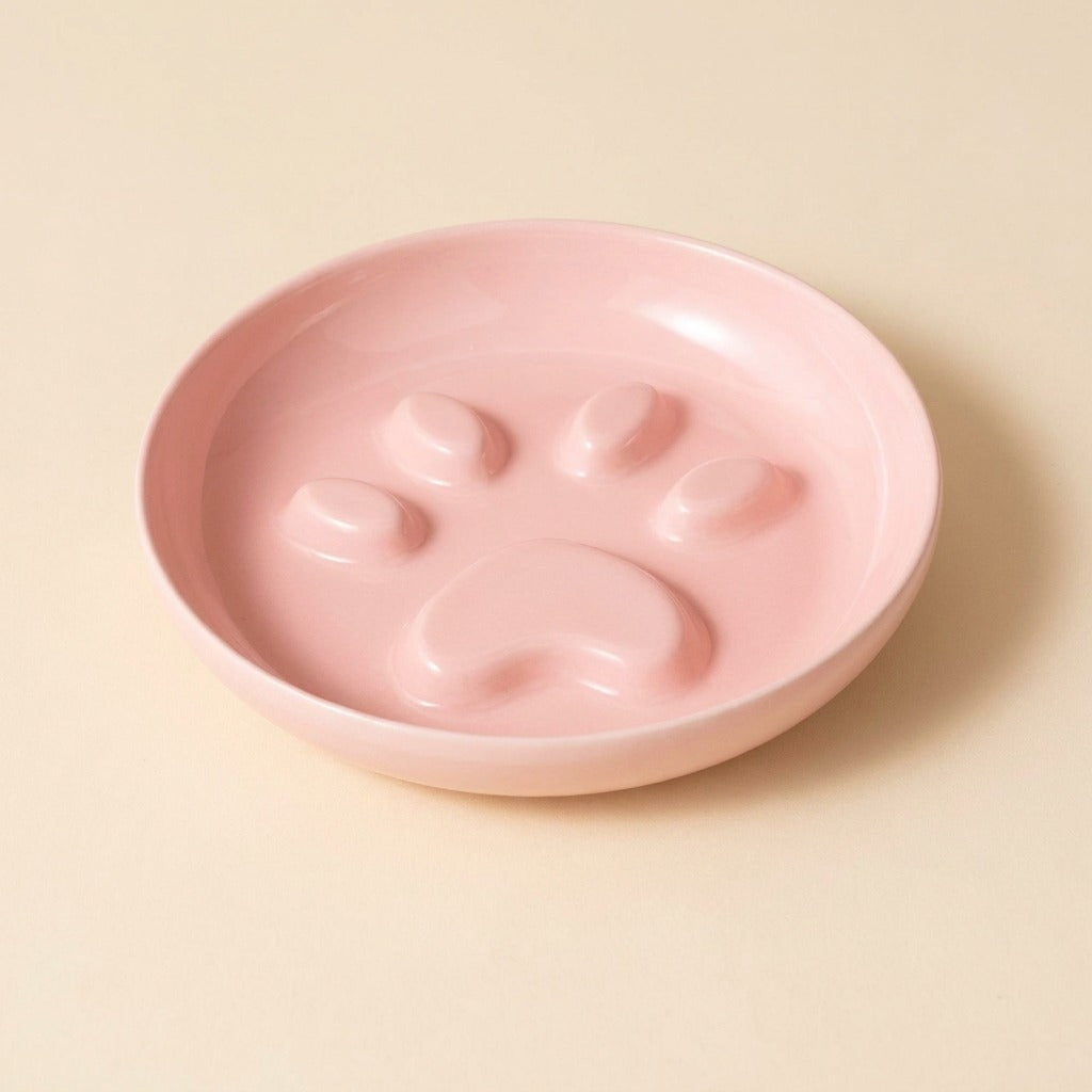 Paw Print Slow Feed Cat Plate in pink, plate only, studio shot