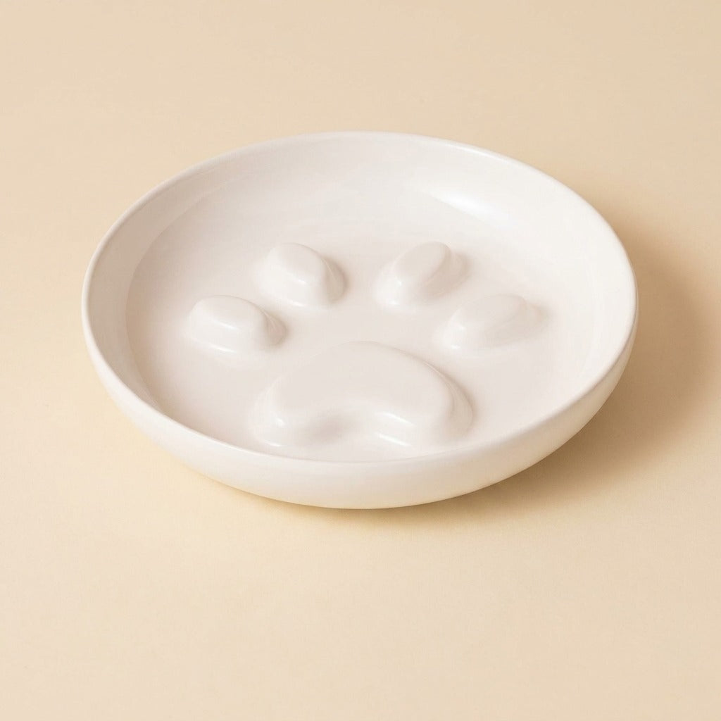 Paw Print Slow Feed Cat Plate in white, plate only, studio shot