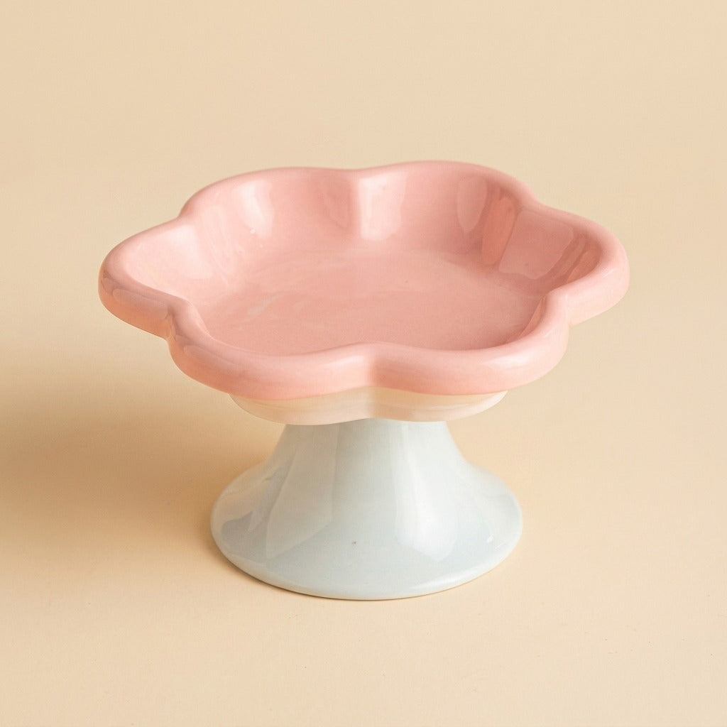 Scalloped Pedestal Cat Bowl, pink bowl on blue pedestal, studio shot