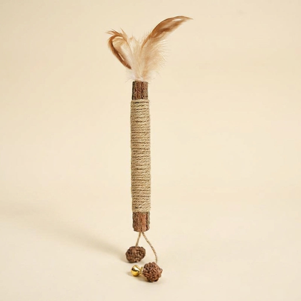 Silvervine chew stick with a feather and a small bell