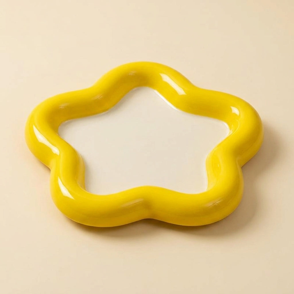 Solid pastel ceramic cat plate, yellow star shape with a raised rim