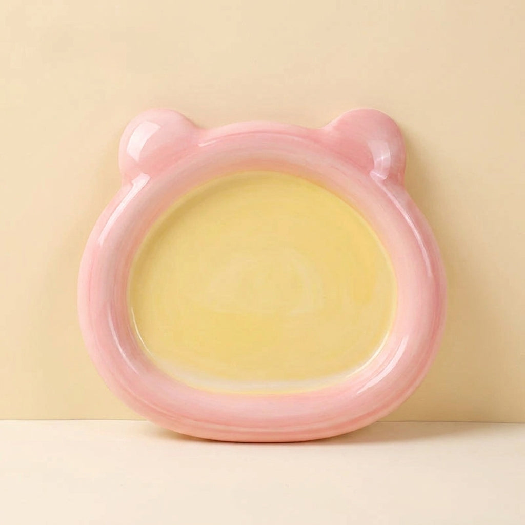 Two tone ceramic cat plate, pink bear shaped rim with a flat yellow inner