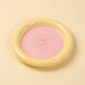 Two Tone Ceramic Cat Plate, round disc with yellow rim and pink inner, studio shot