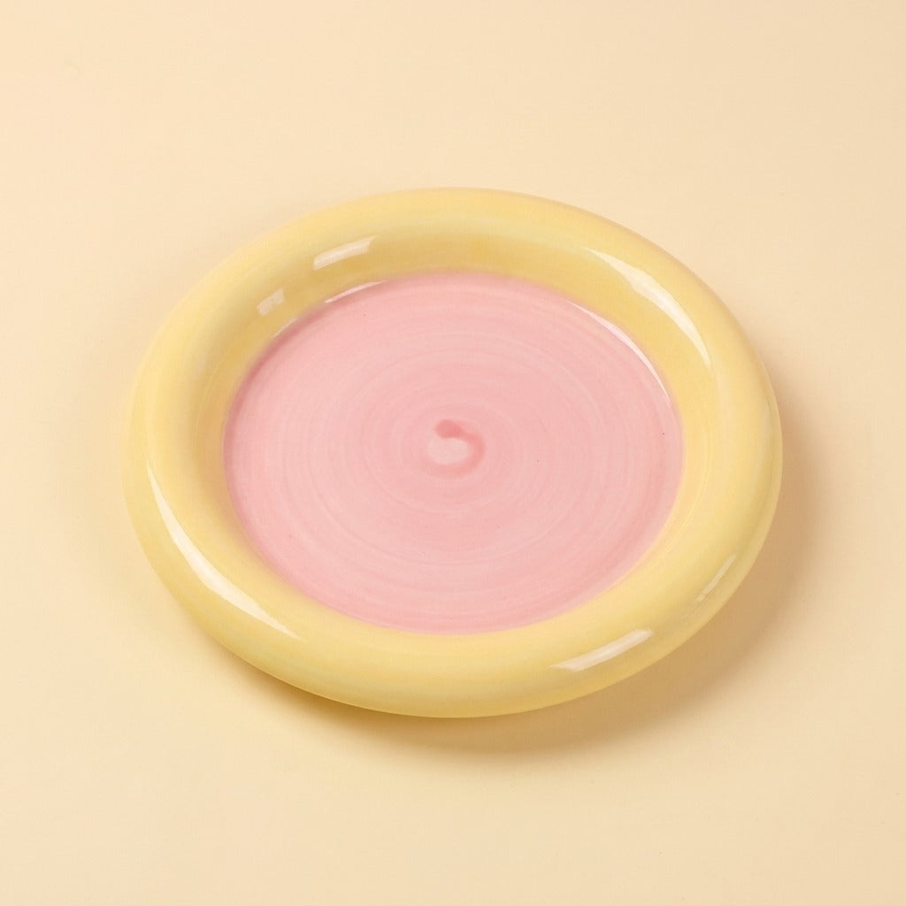 Two Tone Ceramic Cat Plate, round disc with yellow rim and pink inner, studio shot