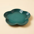 Extra Wide Whisker Relief Ceramic Cat Plate in dark teal green, flower shaped, studio shot