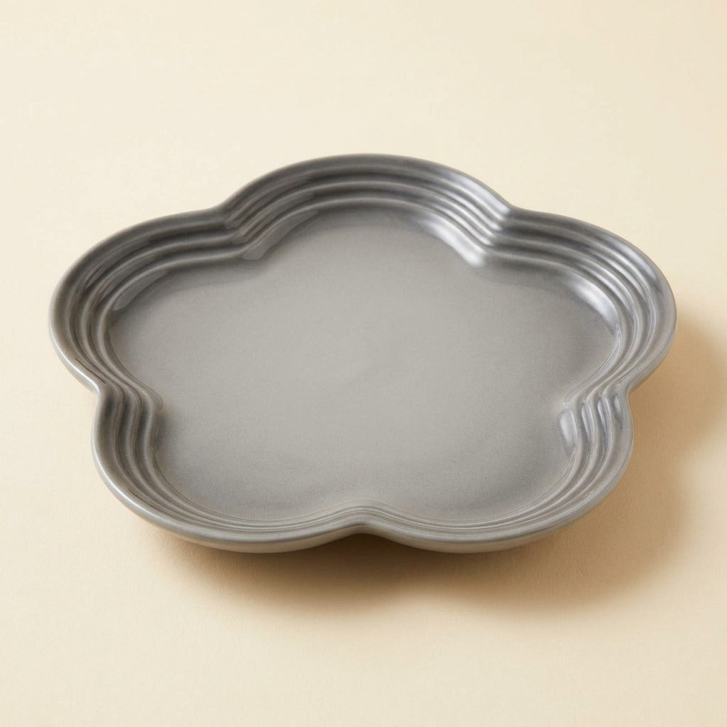 Extra Wide Whisker Relief Ceramic Cat Plate in grey, flower shaped, studio shot