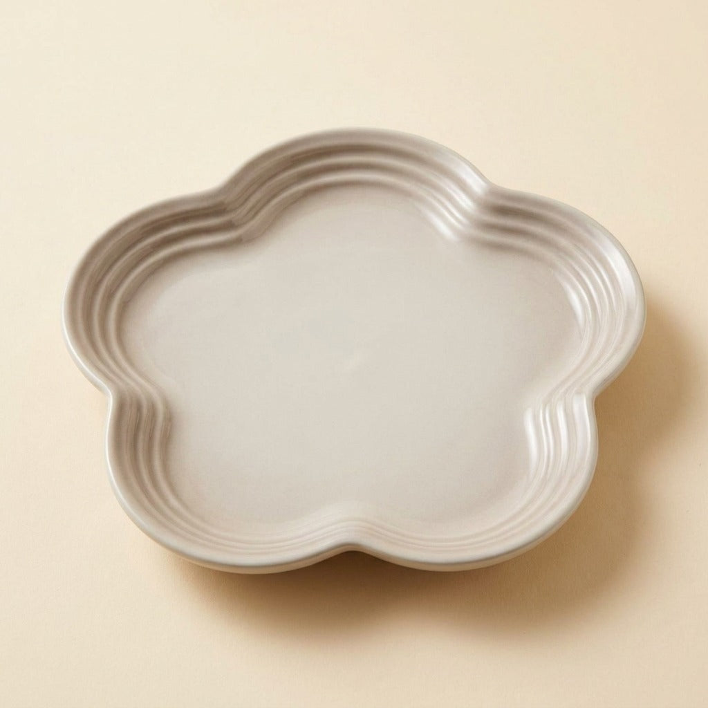Extra Wide Whisker Relief Ceramic Cat Plate in light grey, flower shaped, studio shot