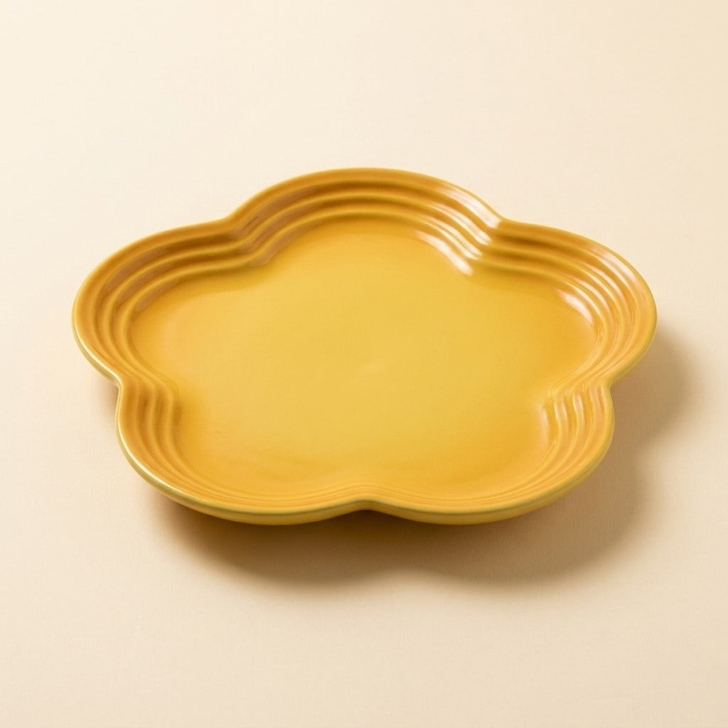 Extra Wide Whisker Relief Ceramic Cat Plate in yellow, flower shaped, studio shot