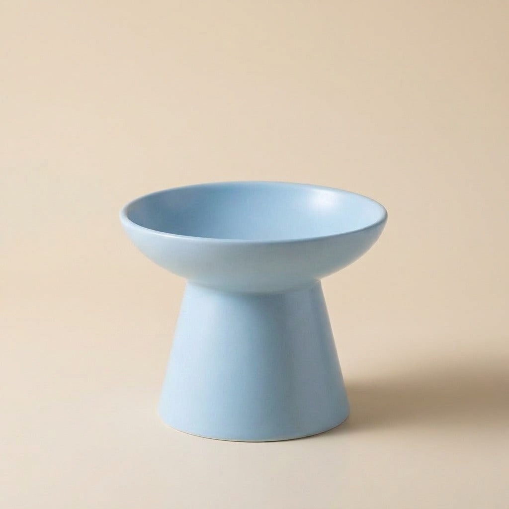 Wide Flared Elevated Ceramic Cat Bowl in light blue, studio shot