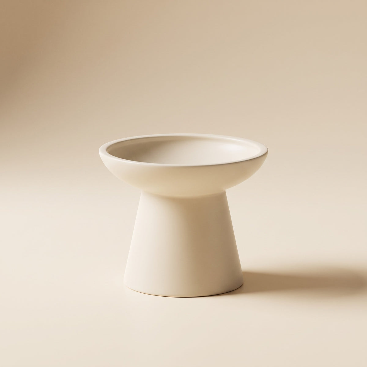 wide flared elevated ceramic cat bowl, studio product photo
