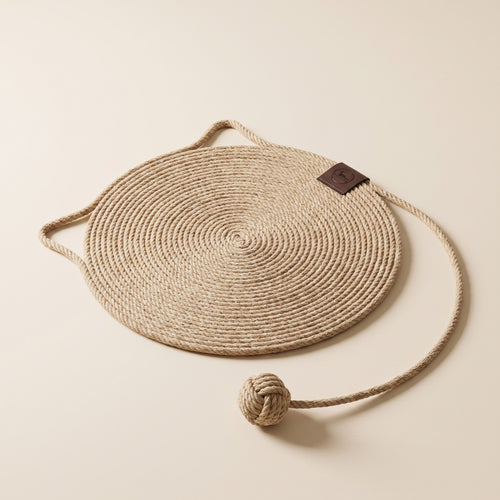 braided rope cat scratch mat with play ball, studio product photo