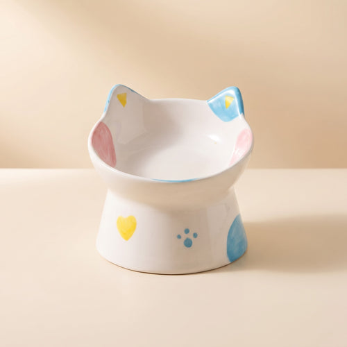cat face tilted ceramic bowl, studio product photo